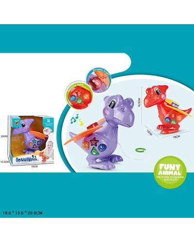 Динозаврик музичний зі світлом та звуком, на батарейці, в асортименті, у коробці 19х13,5х20 см