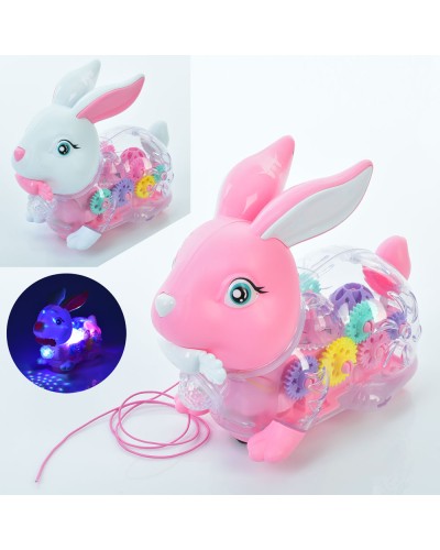 Заєць 19 см музичний зі світлом та звуком, їздить, на батаерйці, в асортименті, у пакеті