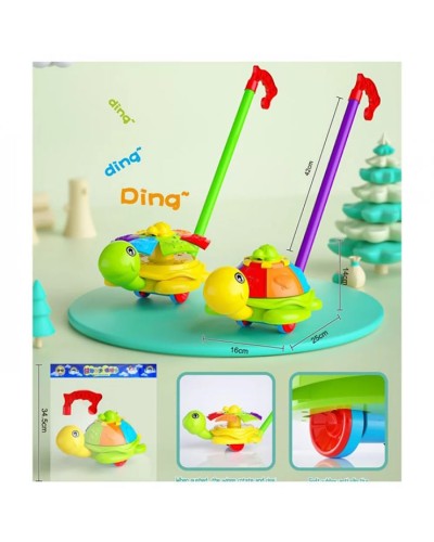 Каталочка «Черепаха» 25 см на паличці 25 см зі звуком та рухомими деталями, у пакеті 28х22х13 см