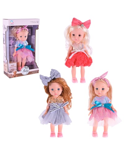 Лялька 26 см зі скляними очима, в асортименті, у коробці 30х8х18 см