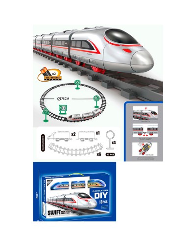 Залізниця 75 см з локомотивом 12 см, 2 вагонами та 13 деталями з дорожні знаками, на батарейках, у коробці 41х24х6 см.