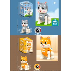 Котик 17 см музичний зі світлом та рухомими деталями, на батарейці, в асортименті, у коробці 12,5х17,5х12,5 см.