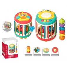 Сортер «Циліндр» 18х13,5х13,5 см з годинником, гумовими гранями, 6 фігуркомит, барабаном, піаніно, музикою та світлом,