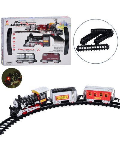 Залізниця 88-66 см зі звуком та світлом з 17 деталей: локомотив, 2 вагони, на батарейці, в асортименті, у коробці 40,5х26х5,5 см.