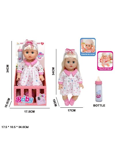 Лялька 34 см інтерактивна з українською озвучкою та аксесуарами, рухається та сміється, на батарейці, у коробці 34х10х17 см