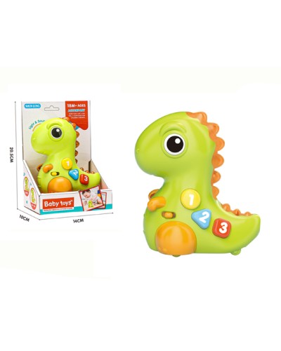 Динозавр 15 см музичний зі звуком, світлом та колесами, на батарейці, в асортименті, у коробці 14х20,5х10 см.
