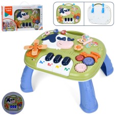 Ігровий столик «Корівка» 2 в 1 39х31х21 см музичний зі світлом та звуком: грова панель 33х29 см, піаніно, рухомі деталі, спінер з текстурними деталями, на батарейці, у коробці 46,5х8х29 см