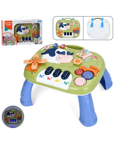 Ігровий столик «Корівка» 2 в 1 39х31х21 см музичний зі світлом та звуком: грова панель 33х29 см, піаніно, рухомі деталі, спінер з текстурними деталями, на батарейці, у коробці 46,5х8х29 см