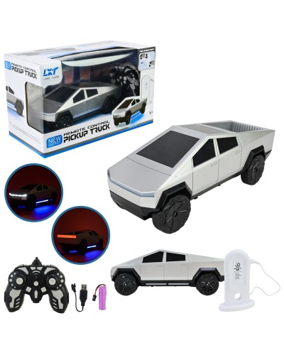 Машина «Tesla Cybertruck» р/к на акумуляторі зі світлом та зарядною станцією, у коробці 30х17х15 см