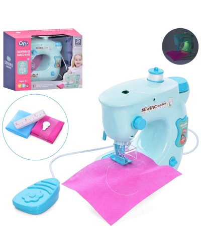 Швейна машина 17 см зі світоом, тканиною, нитками, шиє, на батарейці, у коробці 23х18х9 см