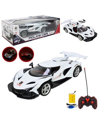 Машина р/к на акумуляторі зі світлом та дверима щор відкриваються, у коробці 40,8х20х12,5 см