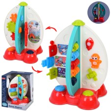 Бізі-ракета 18х18х25 см музична зі світлом, шестернями, засувками, лічильником, лабіринтом та іншими рухомими деталями, на батарейці, у коробці 21х28х20,5 см.