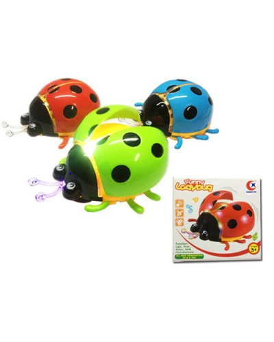 Жучок 13 см музичний зі світлом та рхомими деталями, їздить, на батарейці, в асортименті, у коробці 13х13,5х8 см