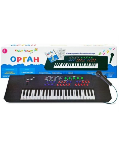 Синтезатор на 3,5 октави та 8 ритмів з мікрофоном та книгою нот,від мережі або батарейки, у коробці 78,5х8,5х2 см